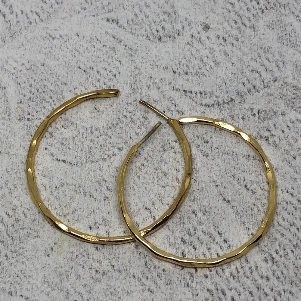 Vintage, signed, gold over sterling silver textured statement hoop earrings.